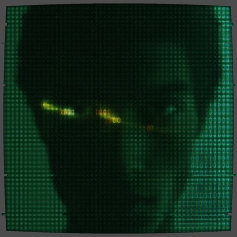 Portrait rendered by the ASCII Magic Matrix effect, fine green ASCII dots with CRT curvature and yellow glitch highlights on the eyes
